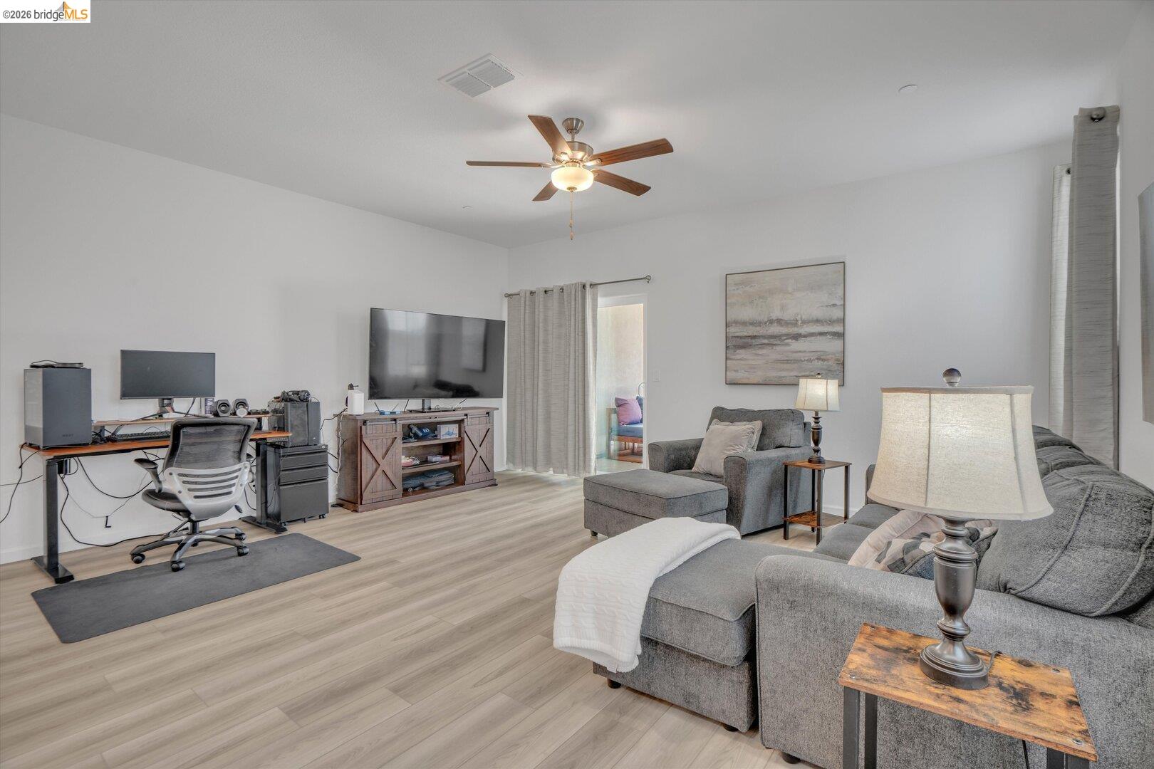 4463 Canada Way Rio Vista, CA 94571 - Photo 19 of 36 living area featuring an office area, light wood-style floors, and a ceiling fan