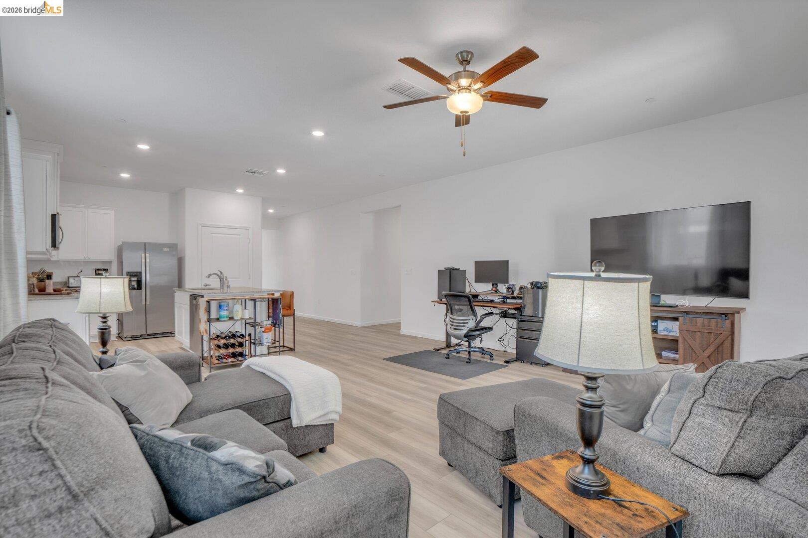 4463 Canada Way Rio Vista, CA 94571 - Photo 21 of 36 living room featuring an office area, light wood finished floors, recessed lighting, and ceiling fan