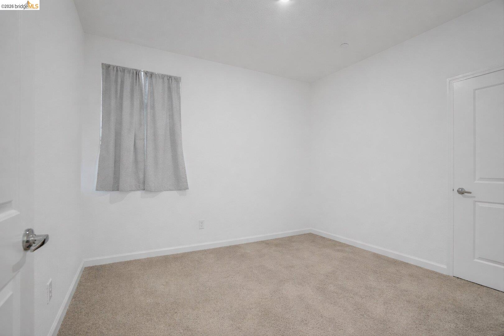 4463 Canada Way Rio Vista, CA 94571 - Photo 23 of 36 carpeted empty room featuring baseboards