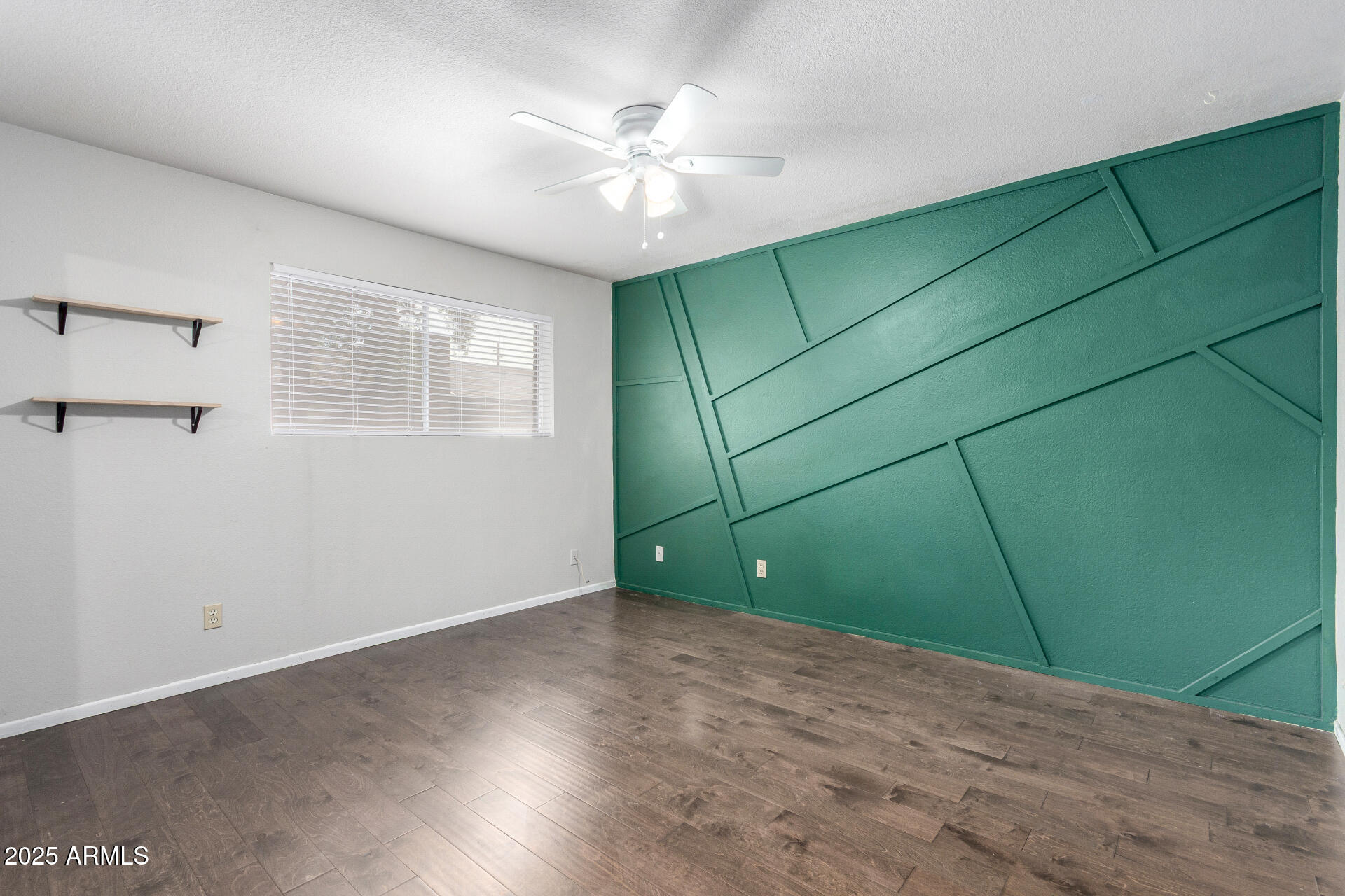 3031 South Rural Road, Unit 45 Tempe, AZ 85282 - Photo 13 of 28 an empty room with fan and window