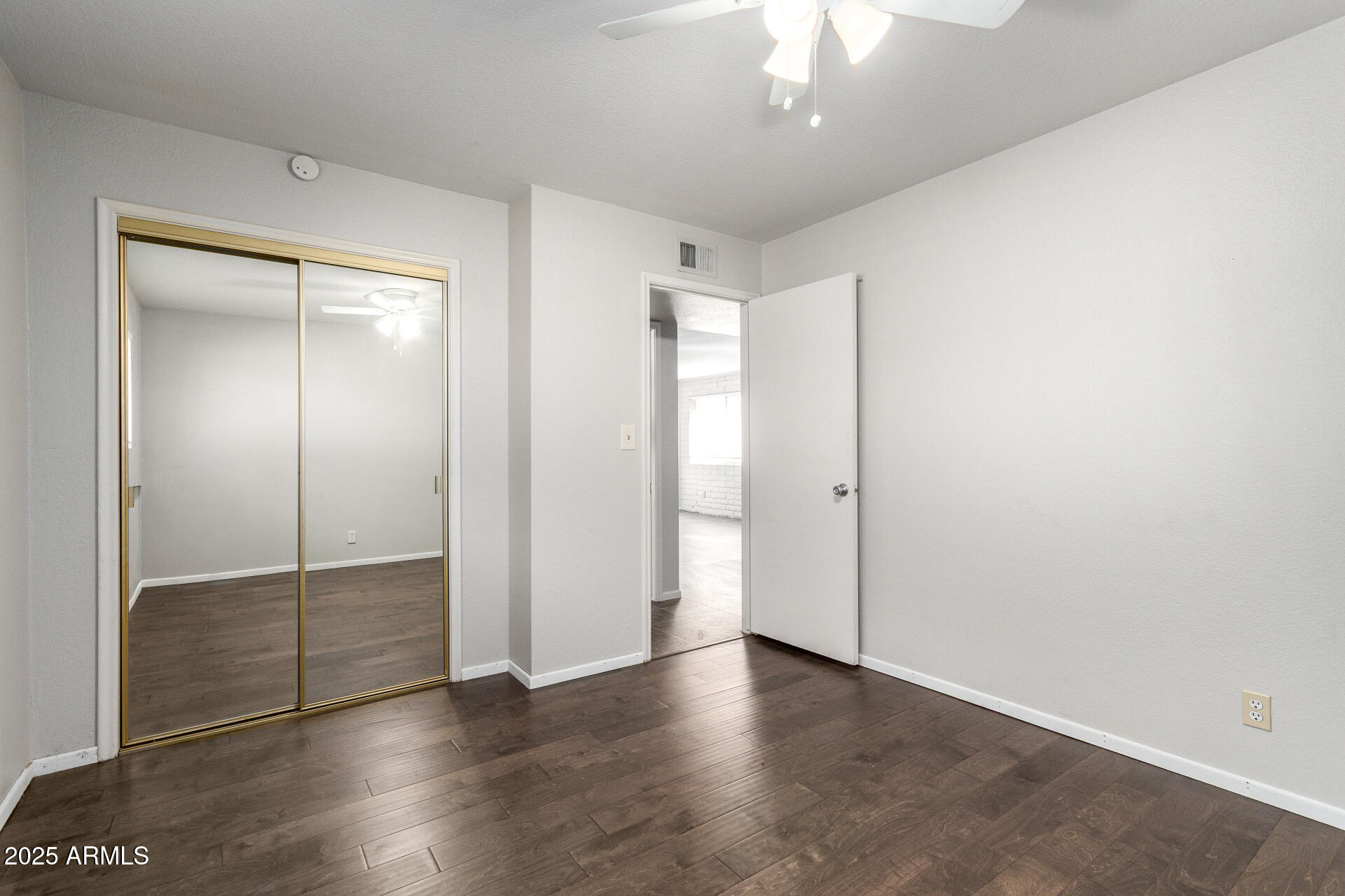3031 South Rural Road, Unit 45 Tempe, AZ 85282 - Photo 20 of 28 wooden floor in an empty room