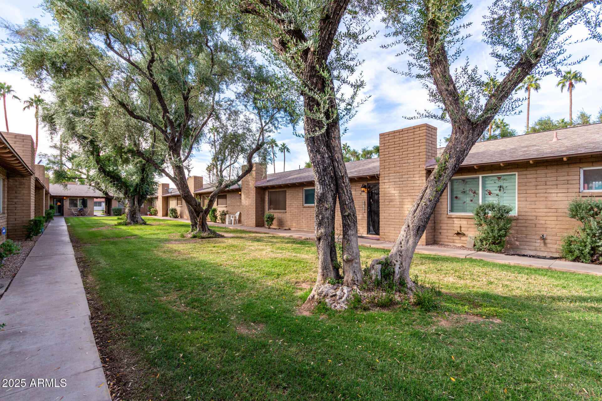3031 South Rural Road, Unit 45 Tempe, AZ 85282 - Photo 28 of 28 a view of a house with a tree and a park