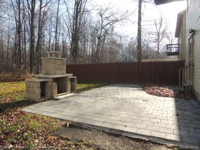 9097 Maple Road Algonac, MI 48001 - Photo 4 of 13 Case # 261-951544 back yard Patio.JPG