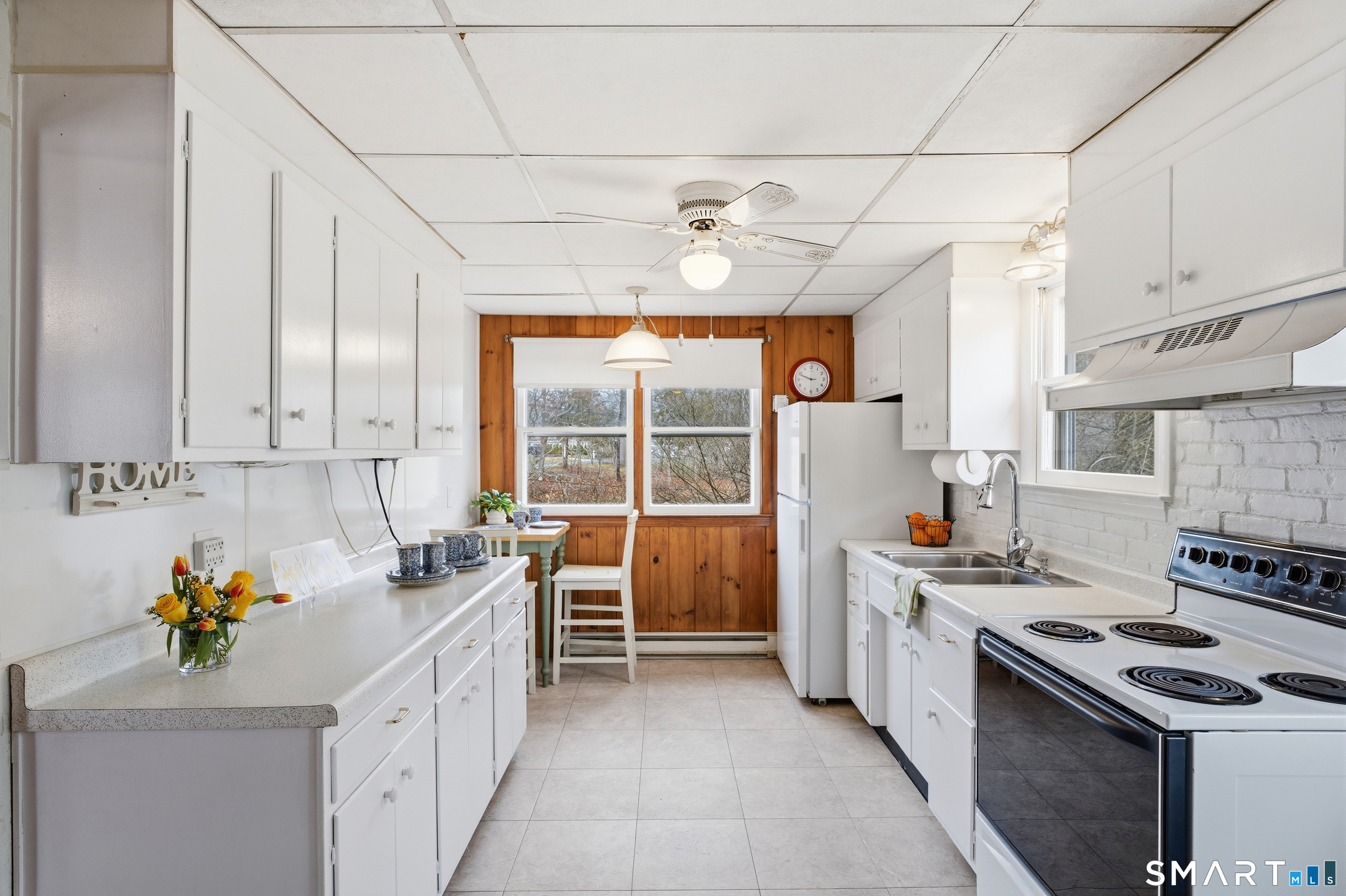 7 Pent Road Madison, CT 06443 - Photo 17 of 39 Sunny eat-in kitchen with views of the salt meadow.