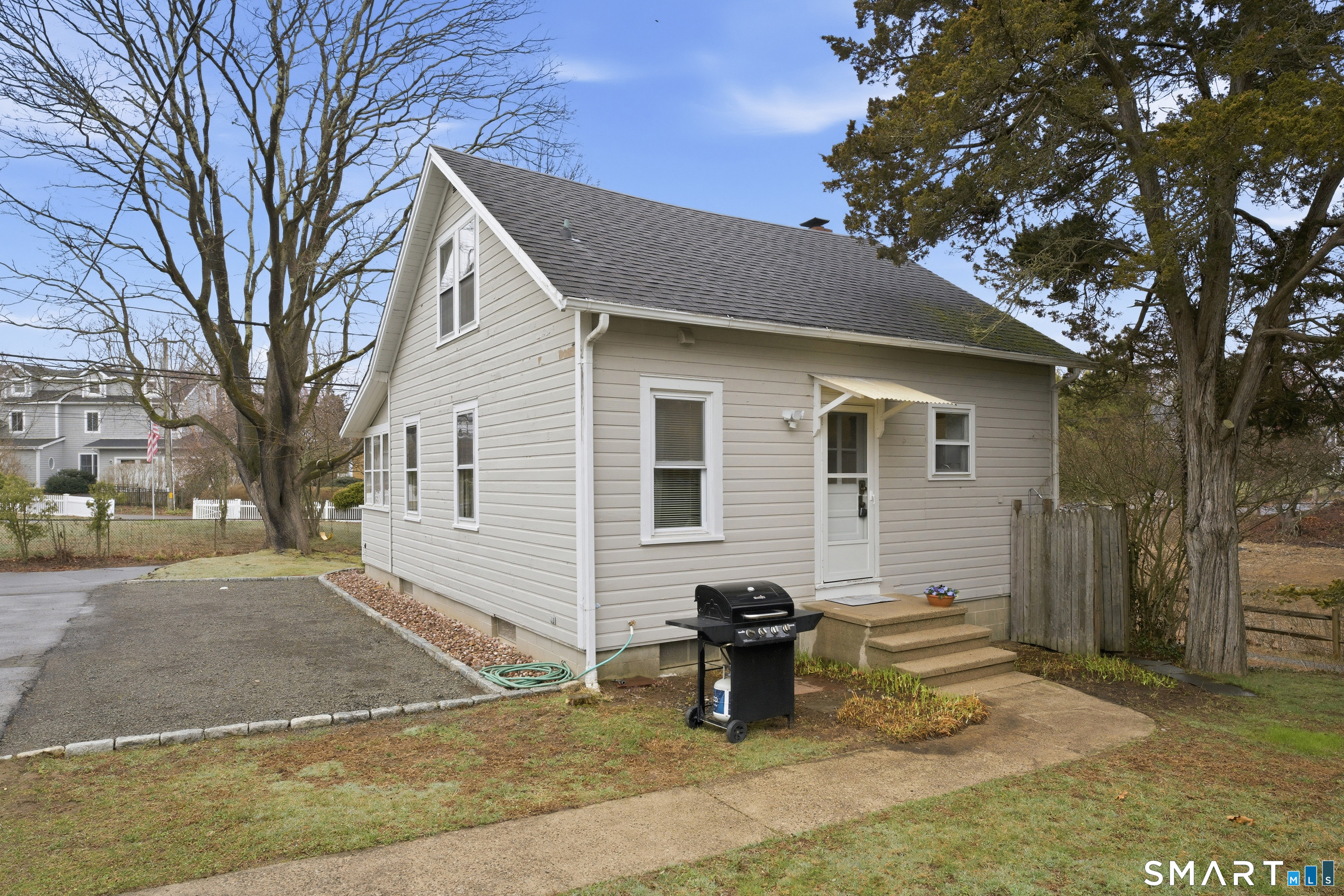 7 Pent Road Madison, CT 06443 - Photo 29 of 39 Back door to main house. Note the outdoor shower.