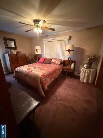 a view of staircase with wooden floor and stairs