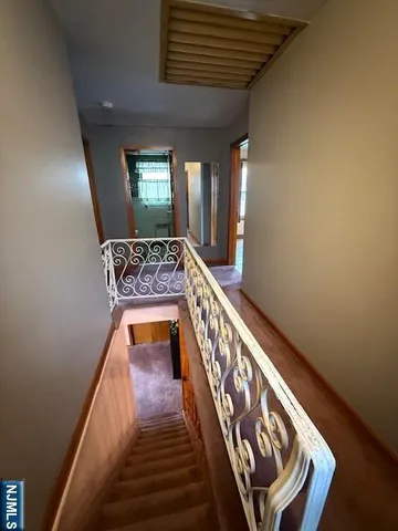a view of a chairs and table in a room