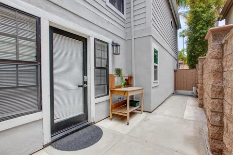 a view of a room that has a bed and a barbeque