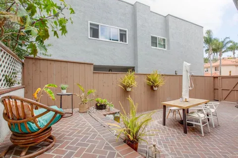 a chairs and table in a patio