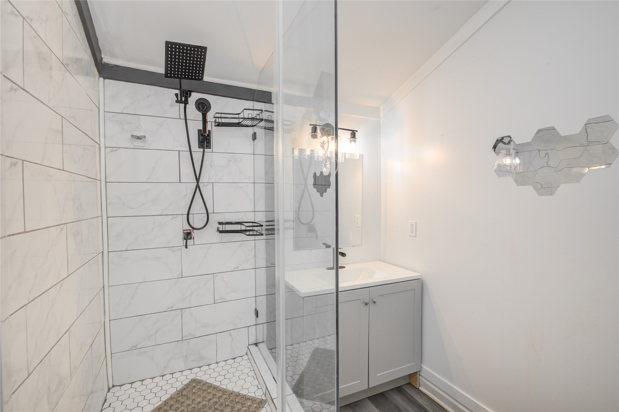609 Hurst Place Angleton, TX 77515 - Photo 21 of 36 a bathroom with a shower