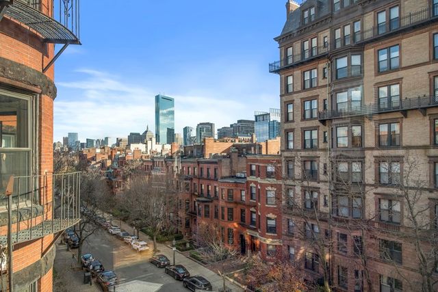 a view of a city with tall buildings