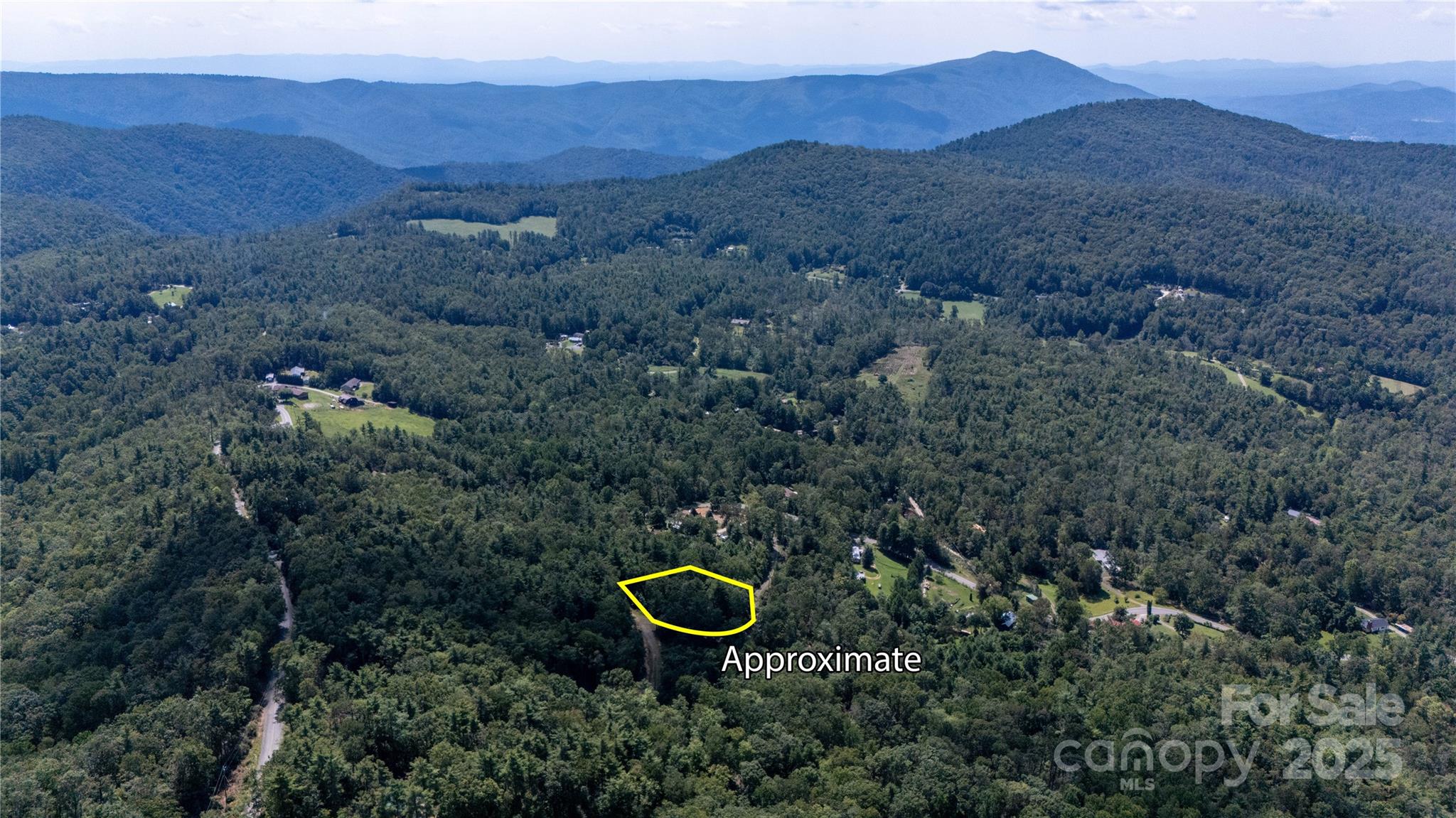 0 Humpback Mountain Road Spruce Pine, NC 28777 - Photo 21 of 25 an aerial view of a house with a backyard