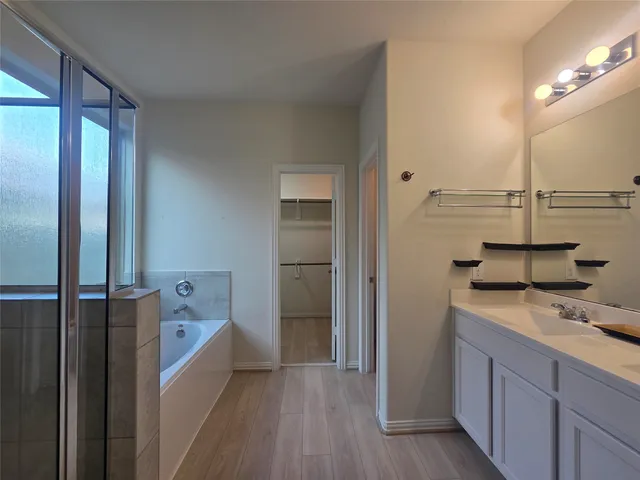 a view of a kitchen from the hallway