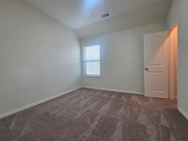 a bathroom with a sink and bathtub with toilet
