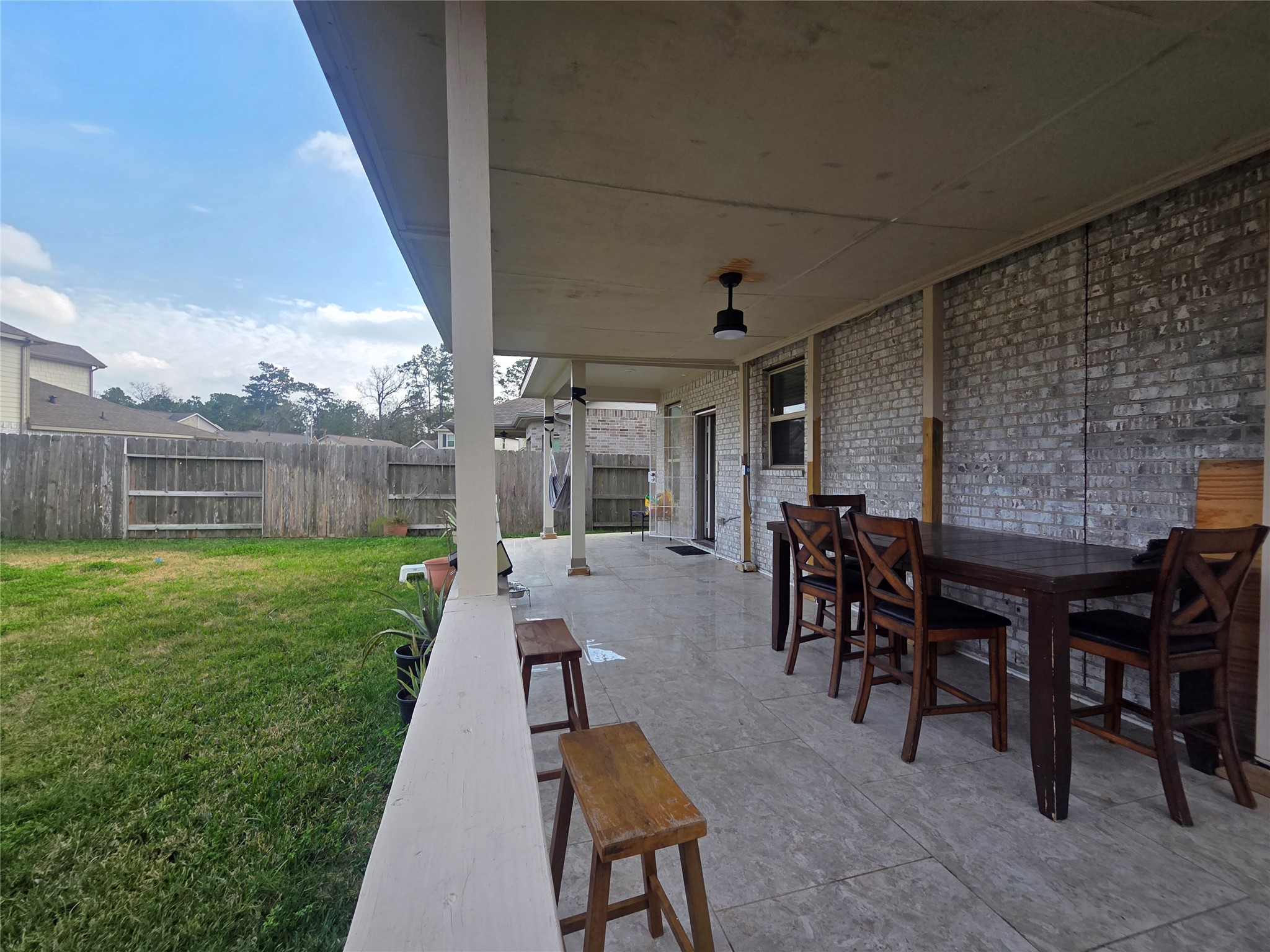 28137 Aspen Horizon Drive Spring, TX 77386 - Photo 28 of 33 a patio with table and chairs