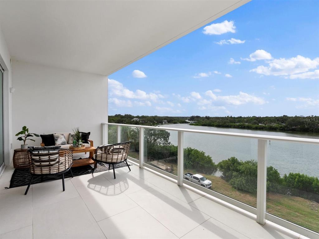 1020 Sunset Point Road, Unit 410 Clearwater, FL 33755 - Photo 11 of 27 a living room with furniture