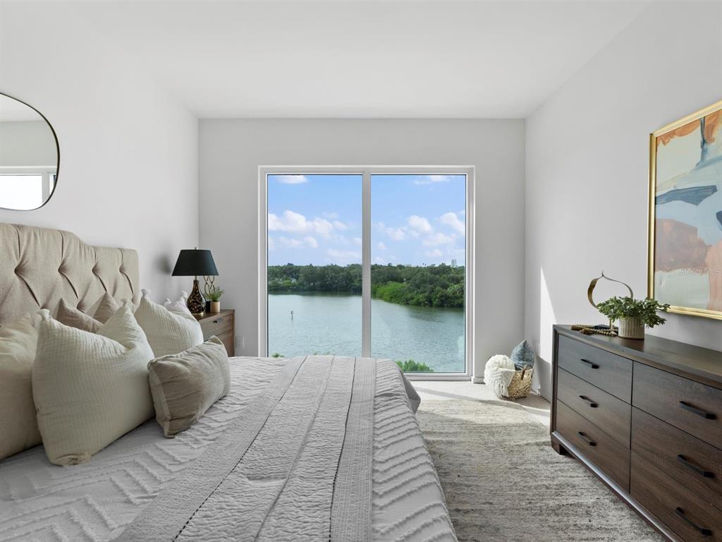 1020 Sunset Point Road, Unit 410 Clearwater, FL 33755 - Photo 18 of 27 a living room with furniture