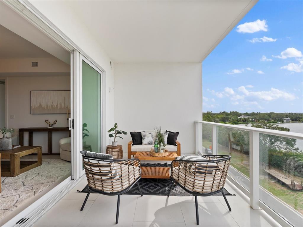 1020 Sunset Point Road, Unit 410 Clearwater, FL 33755 - Photo 8 of 27 a living room with furniture