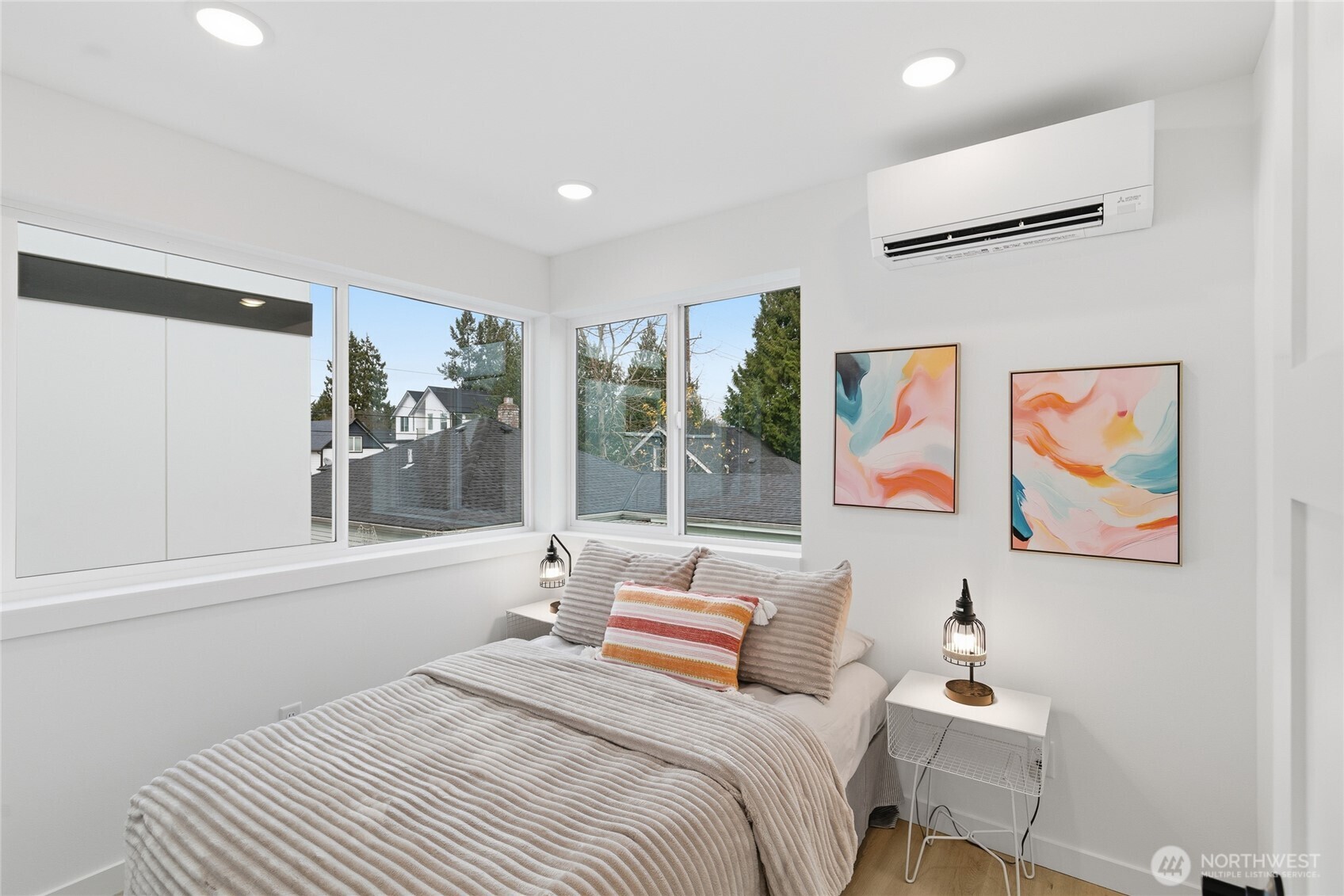 805 South Sullivan Street Seattle, WA 98108 - Photo 13 of 20 a bedroom with a bed and a window