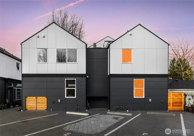 a view of a house with a street