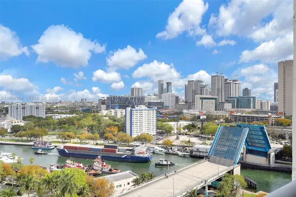 a view of a city with lawn chairs