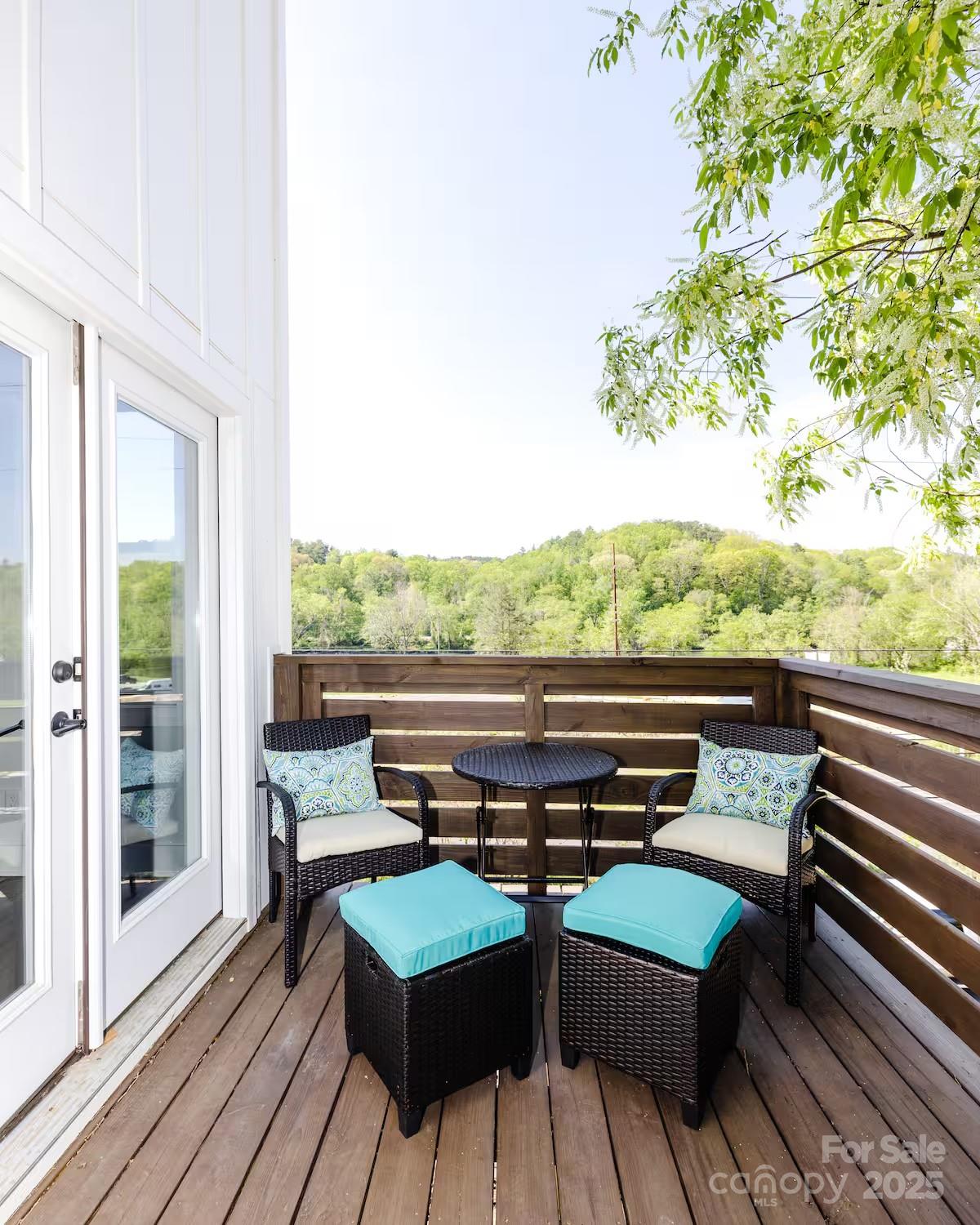 1057 Riverside Drive Asheville, NC 28804 - Photo 3 of 42 a view of sitting area with furniture and wooden floor