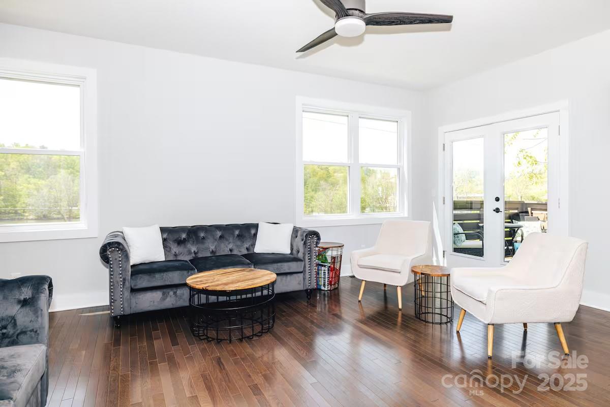 1057 Riverside Drive Asheville, NC 28804 - Photo 4 of 42 a living room with furniture and a window