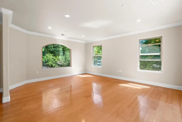 an empty room with windows