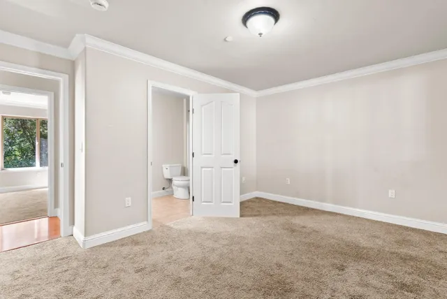 a bathroom with a toilet sink and a bathtub