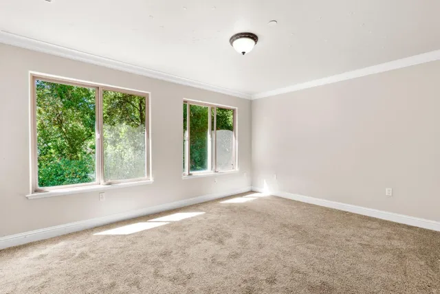 a view of livingroom with furniture and front door