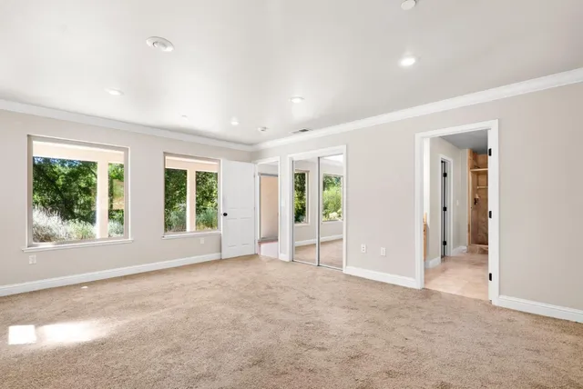 an empty room with windows