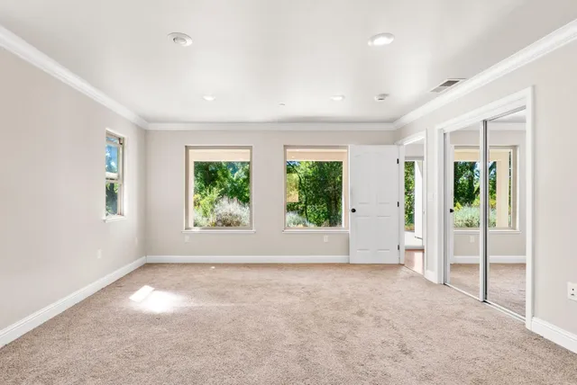 a bathroom with a sink double vanity and a mirror