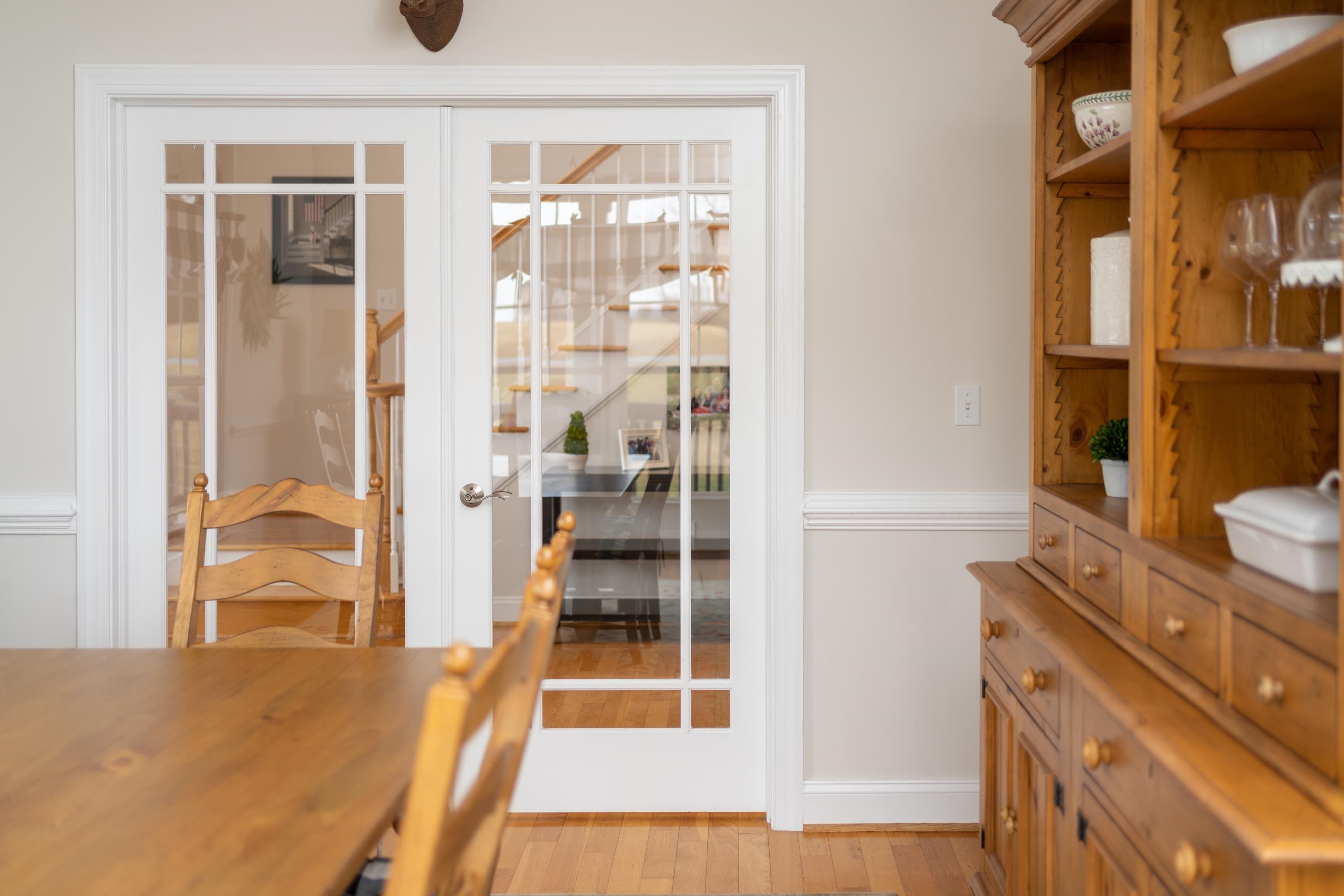 25 Ridgemore Drive Raphine, VA 24472 - Photo 17 of 75 a view of a hallway with wooden floor and dining room