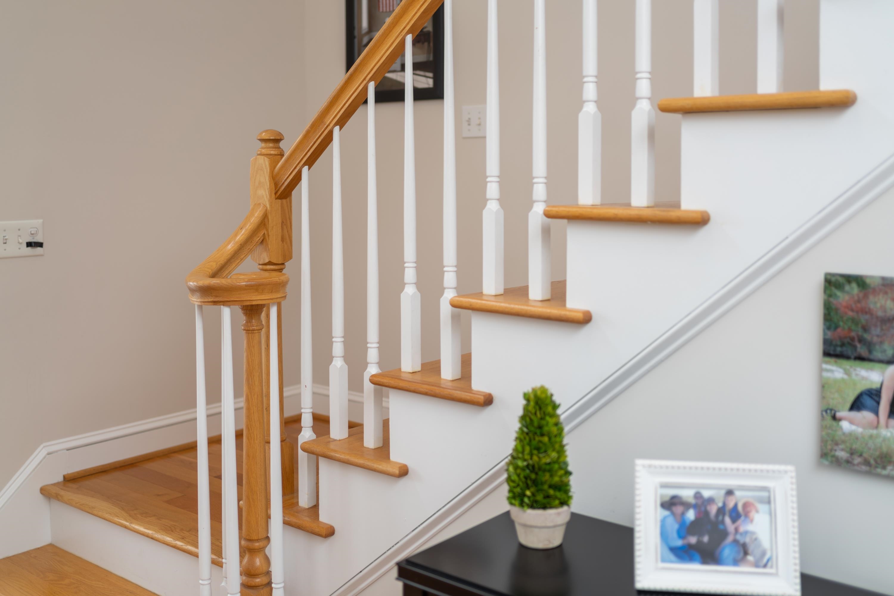 25 Ridgemore Drive Raphine, VA 24472 - Photo 54 of 75 a view of staircase with lots of frames on wall and a window