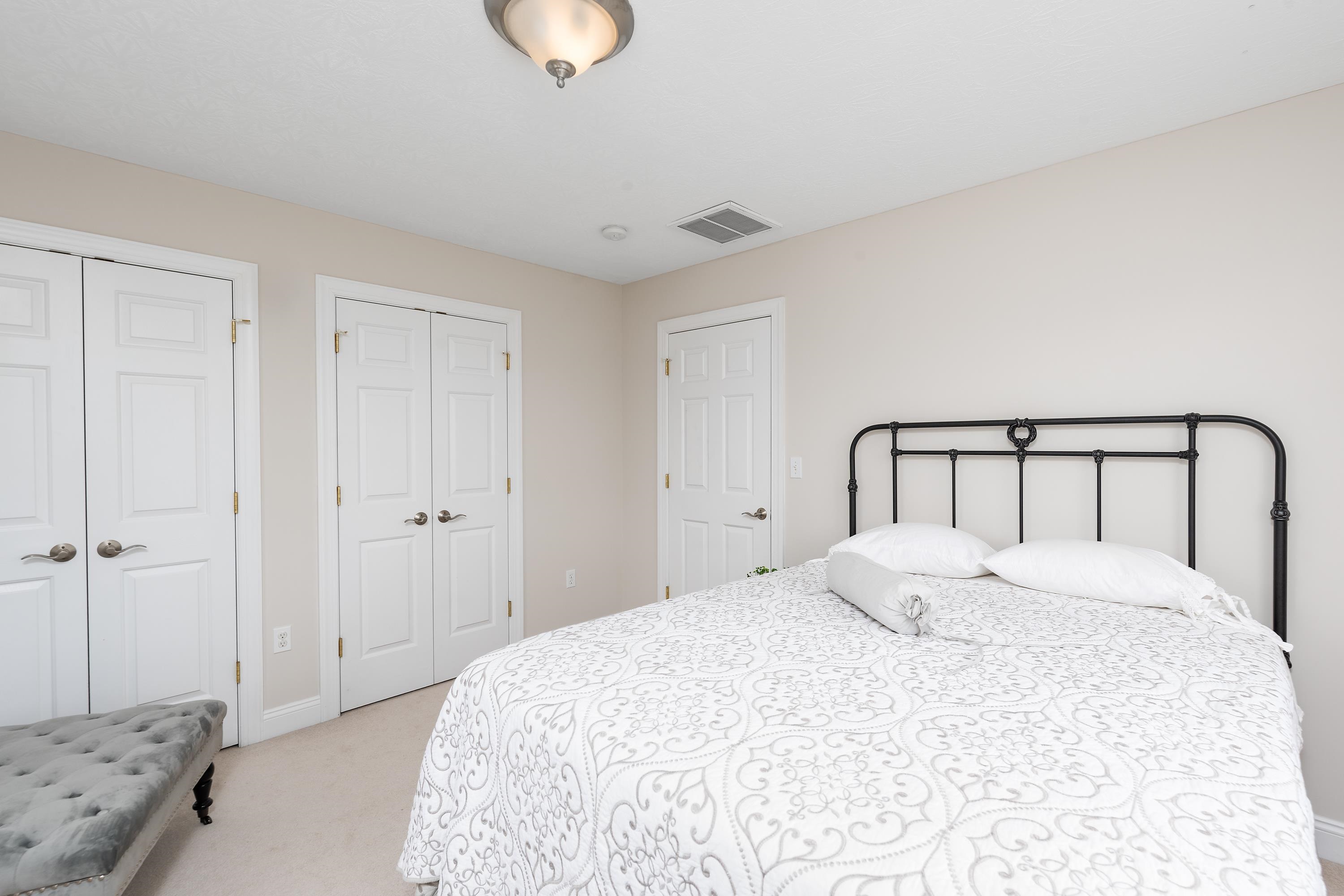 25 Ridgemore Drive Raphine, VA 24472 - Photo 60 of 75 a bedroom with a bed and a window