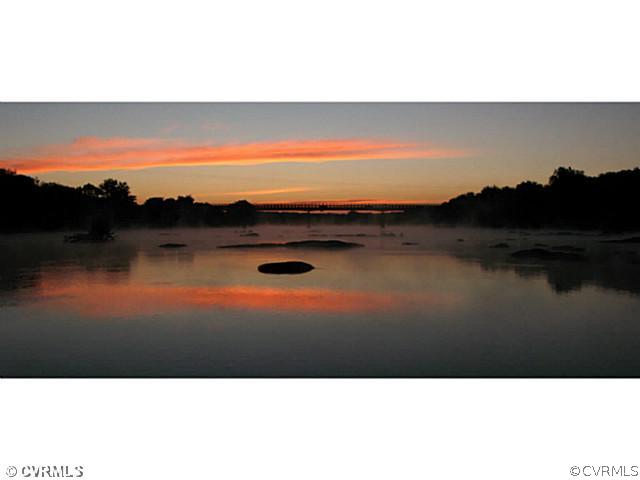4411 Knob Road Richmond, VA 23235 - Photo 14 of 18 a view of lake and mountain