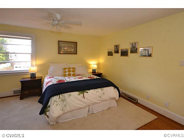 4411 Knob Road Richmond, VA 23235 - Photo 6 of 18 a bedroom with a bed and a window