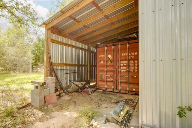 a view of a yard with an outdoor space