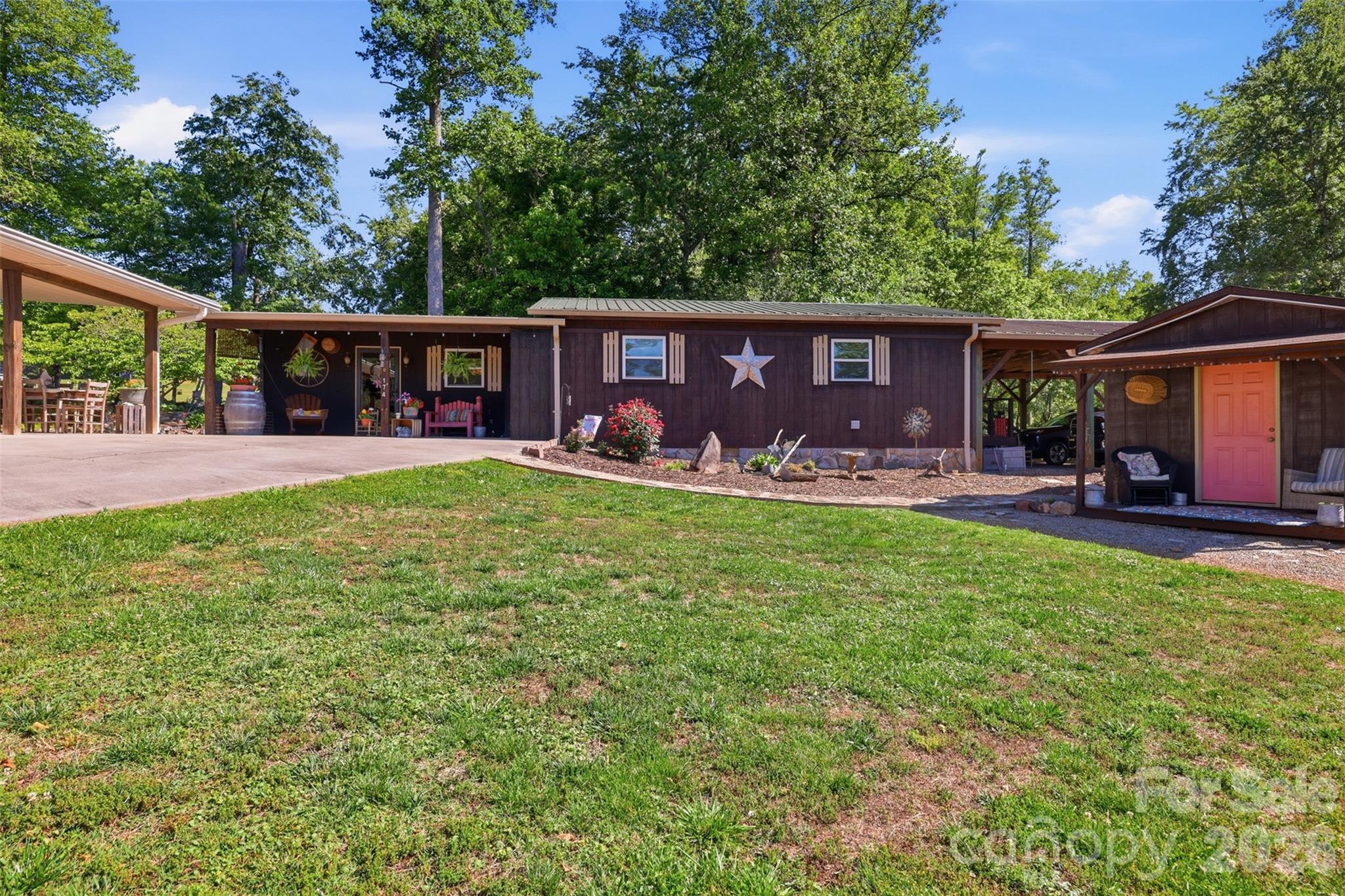 176-174 Oak Hollow Road Union Grove, NC 28689 - Photo 6 of 48 a front view of house with yard patio and green space