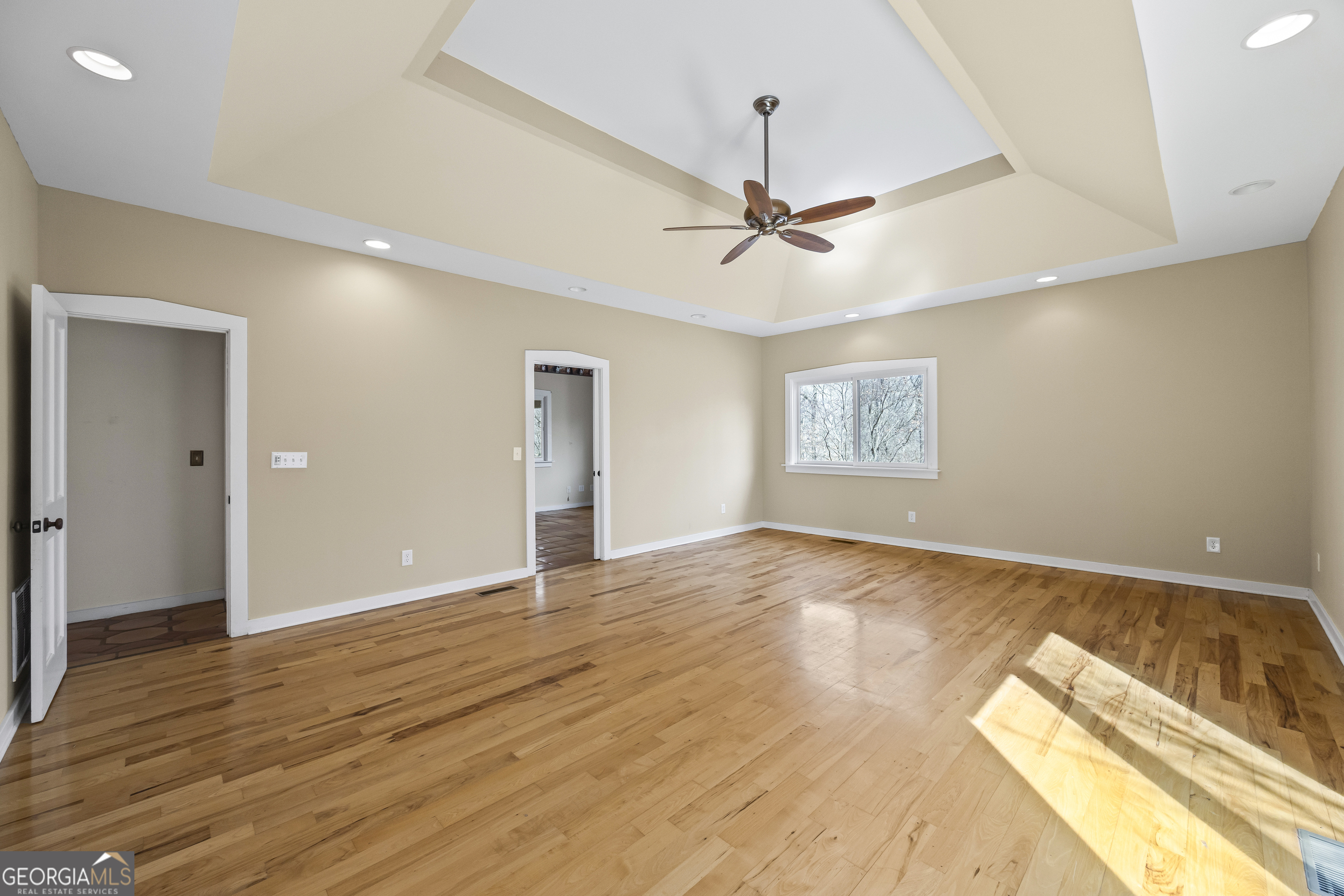 2223 Salem Road Watkinsville, GA 30677 - Photo 13 of 94 a view of an empty room with window and wooden floor