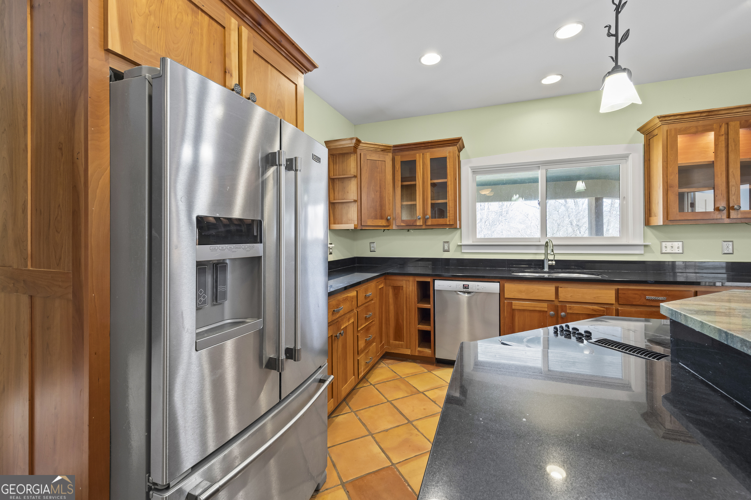 2223 Salem Road Watkinsville, GA 30677 - Photo 33 of 94 a kitchen with stainless steel appliances granite countertop a refrigerator and a stove