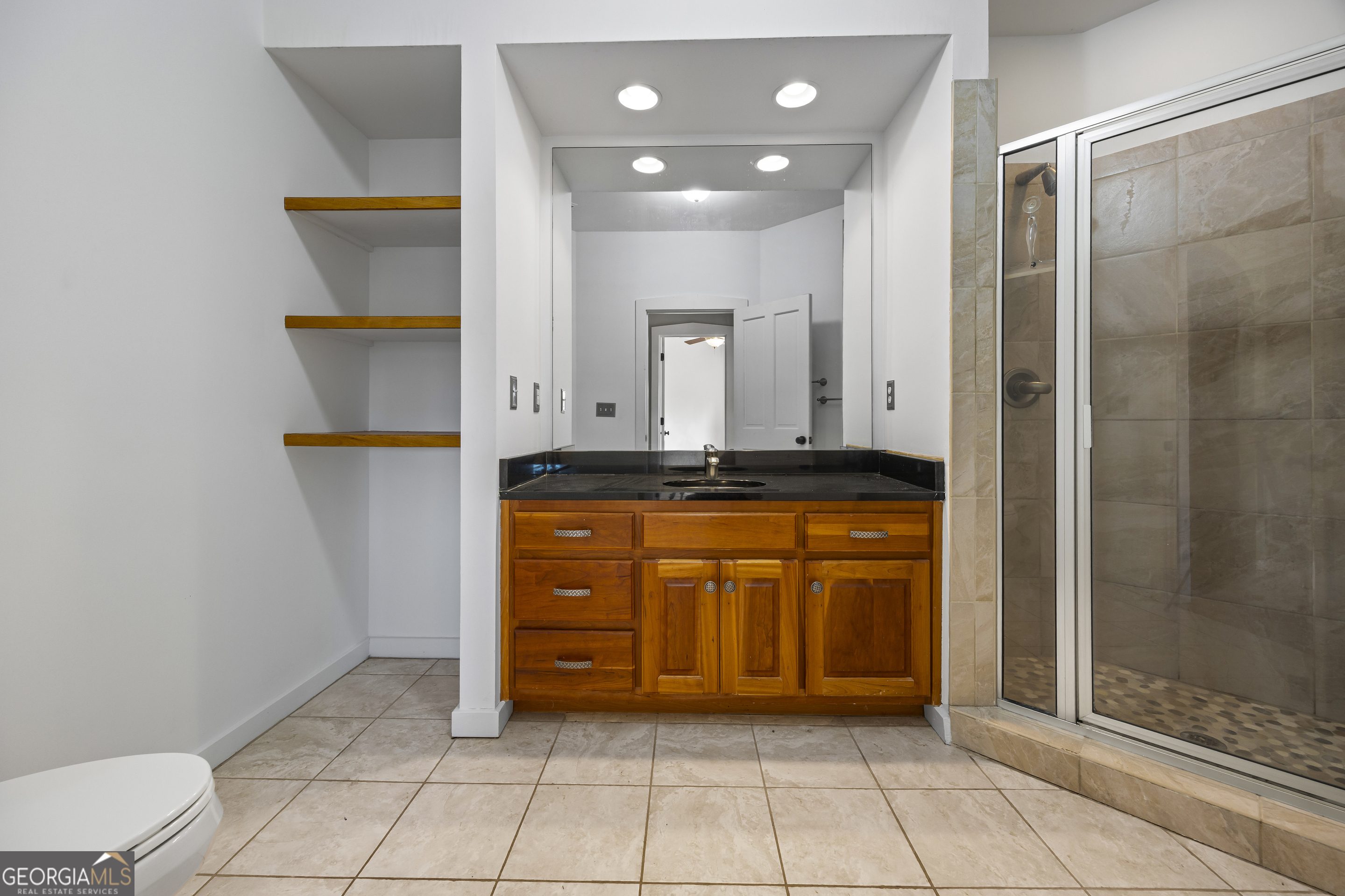 2223 Salem Road Watkinsville, GA 30677 - Photo 47 of 94 a spacious bathroom with a mirror and a shower