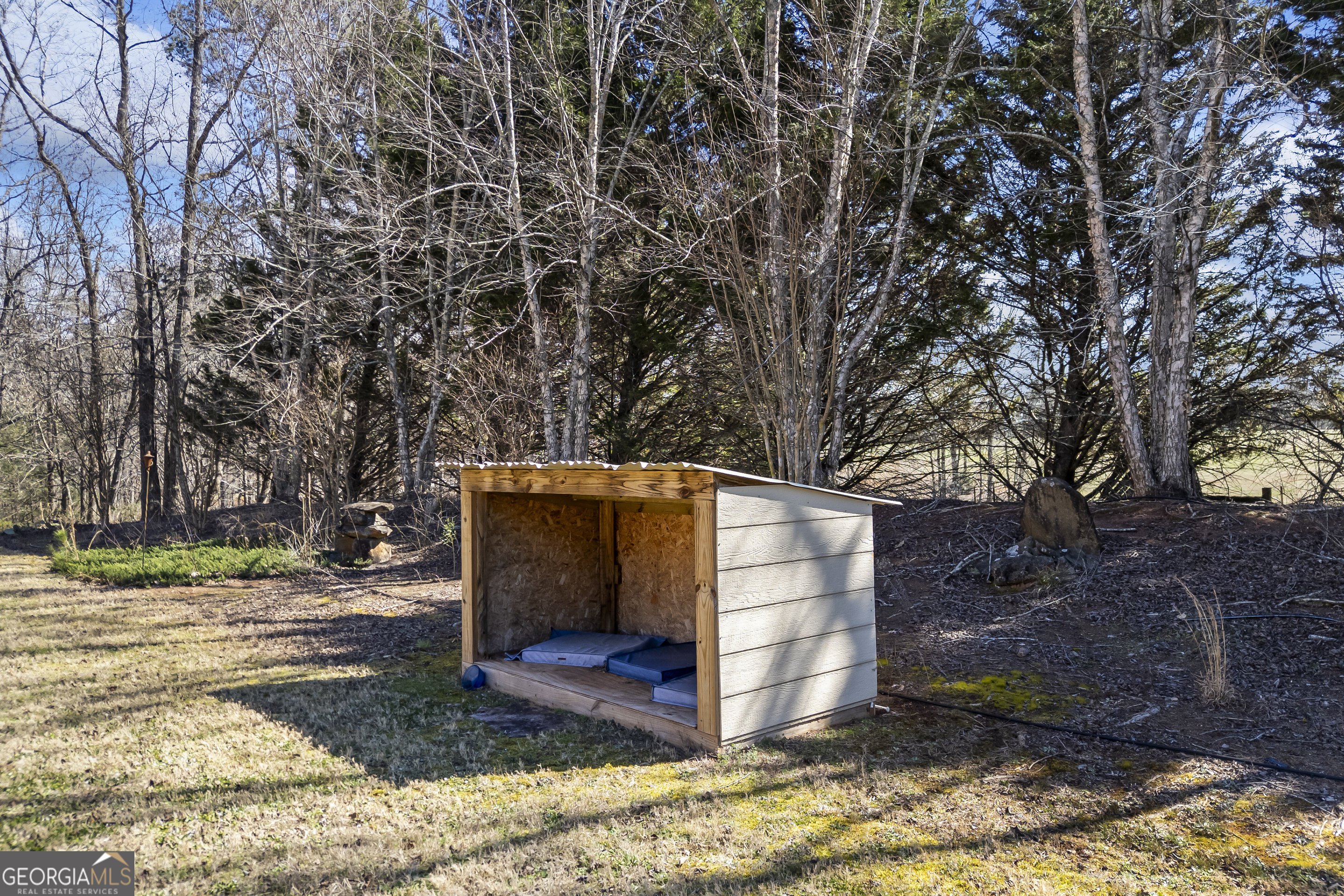 2223 Salem Road Watkinsville, GA 30677 - Photo 56 of 94 a view of a barn in the middle of a yard