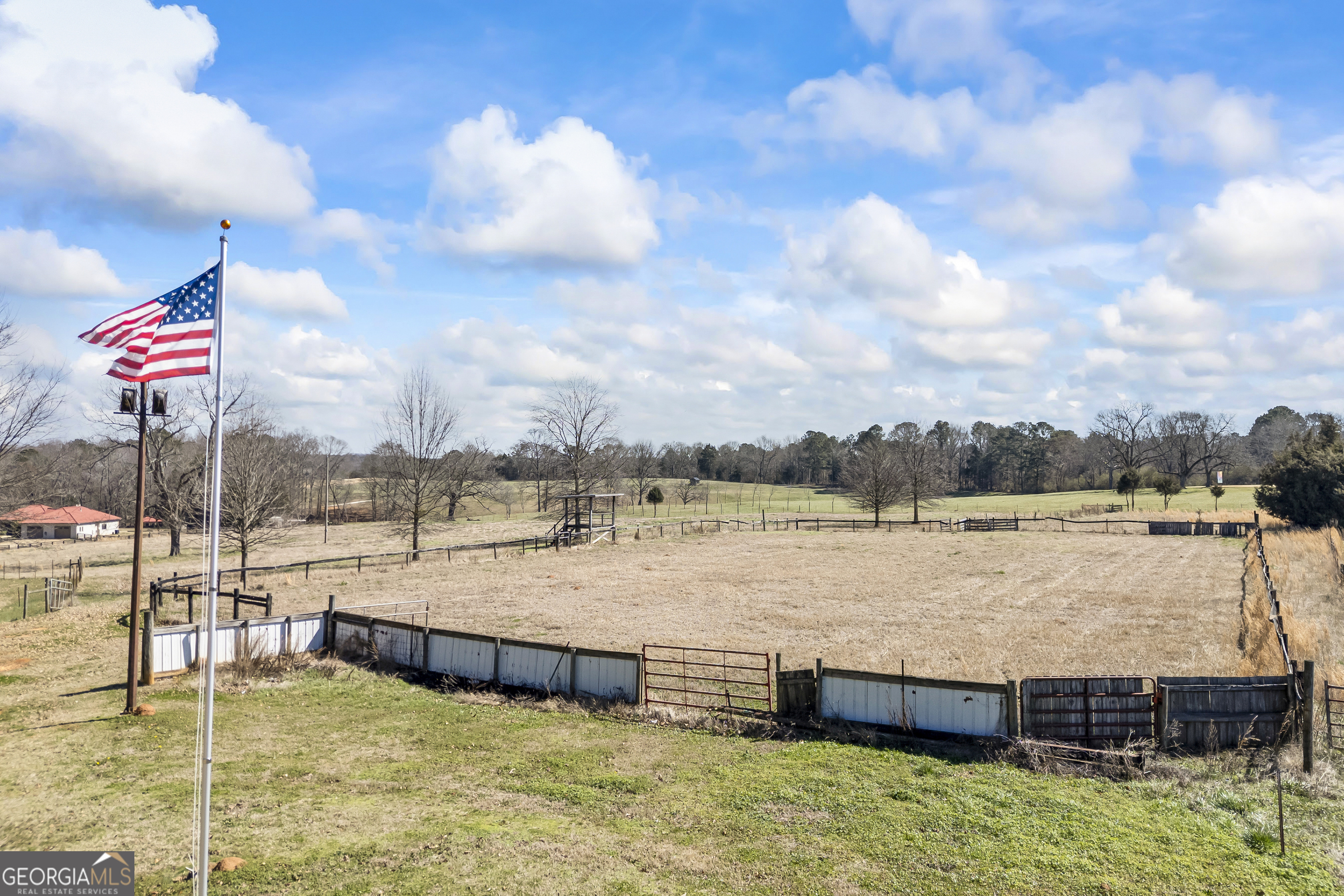 2223 Salem Road Watkinsville, GA 30677 - Photo 63 of 94 a view of a lake with couches in the background