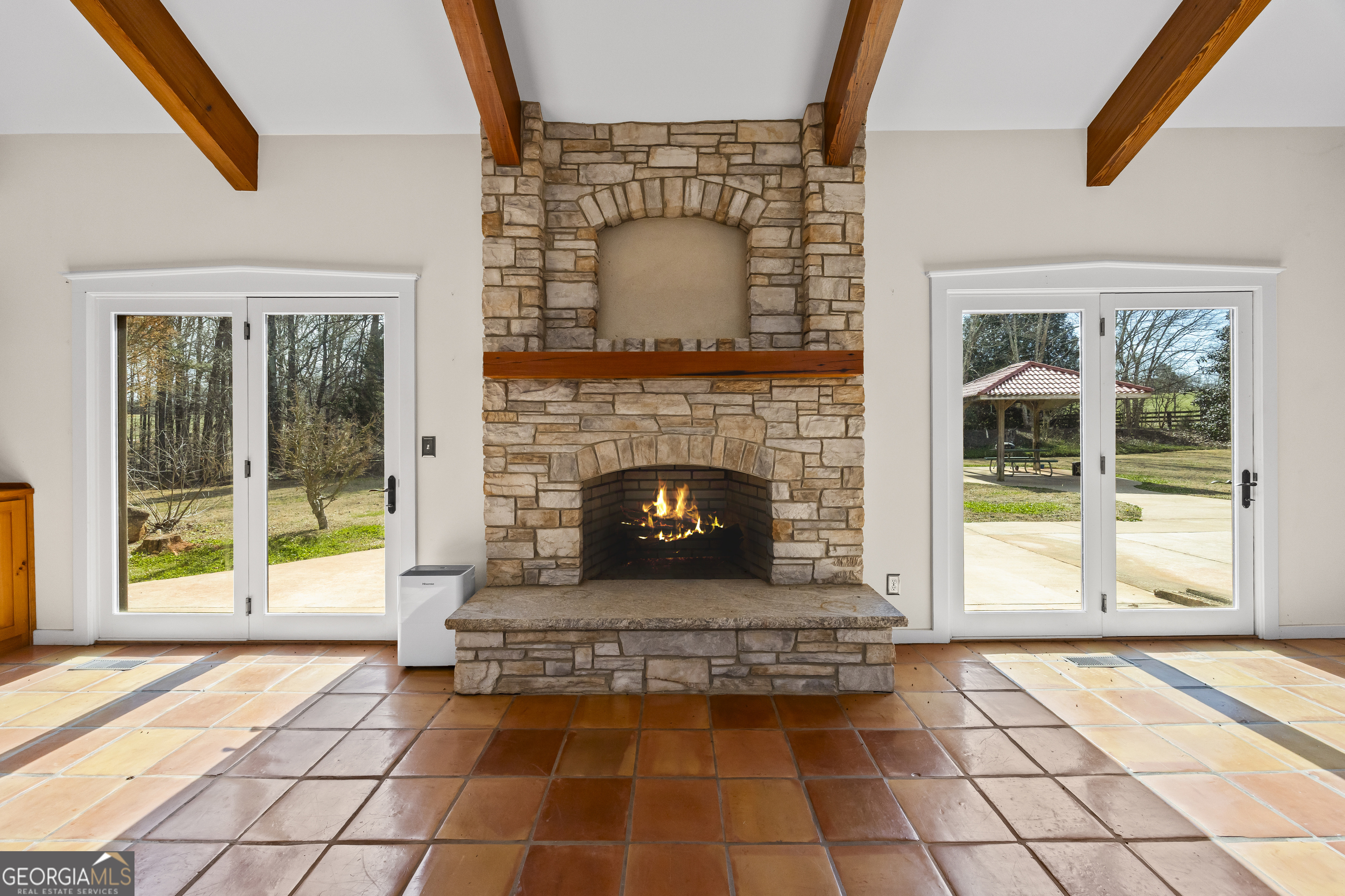 2223 Salem Road Watkinsville, GA 30677 - Photo 7 of 94 a view of a livingroom with fireplace and windows