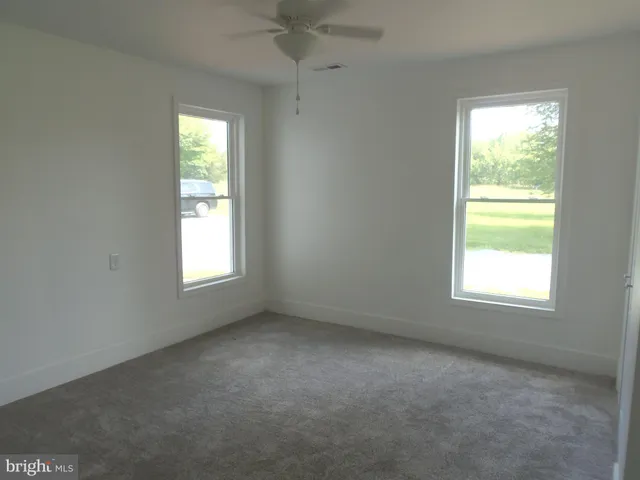 an empty room with a window