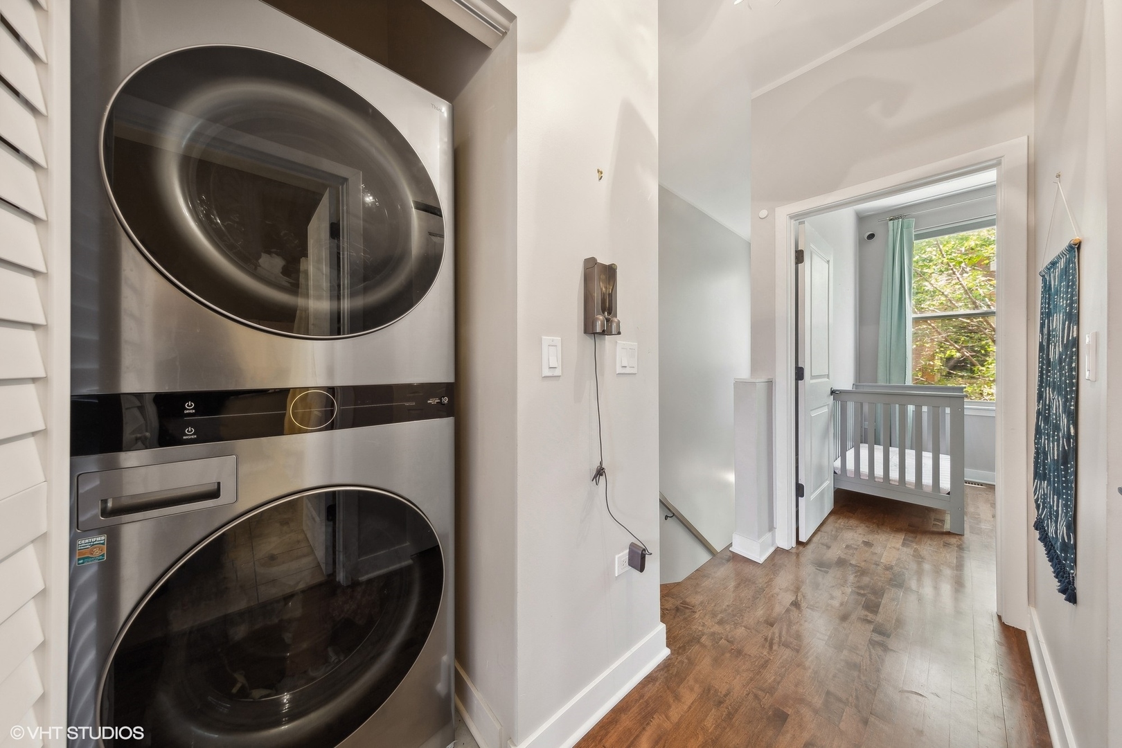 1244 West Monroe Street, Unit 6 Chicago, IL 60607 - Photo 12 of 21 a view of a hallway with washer and dryer