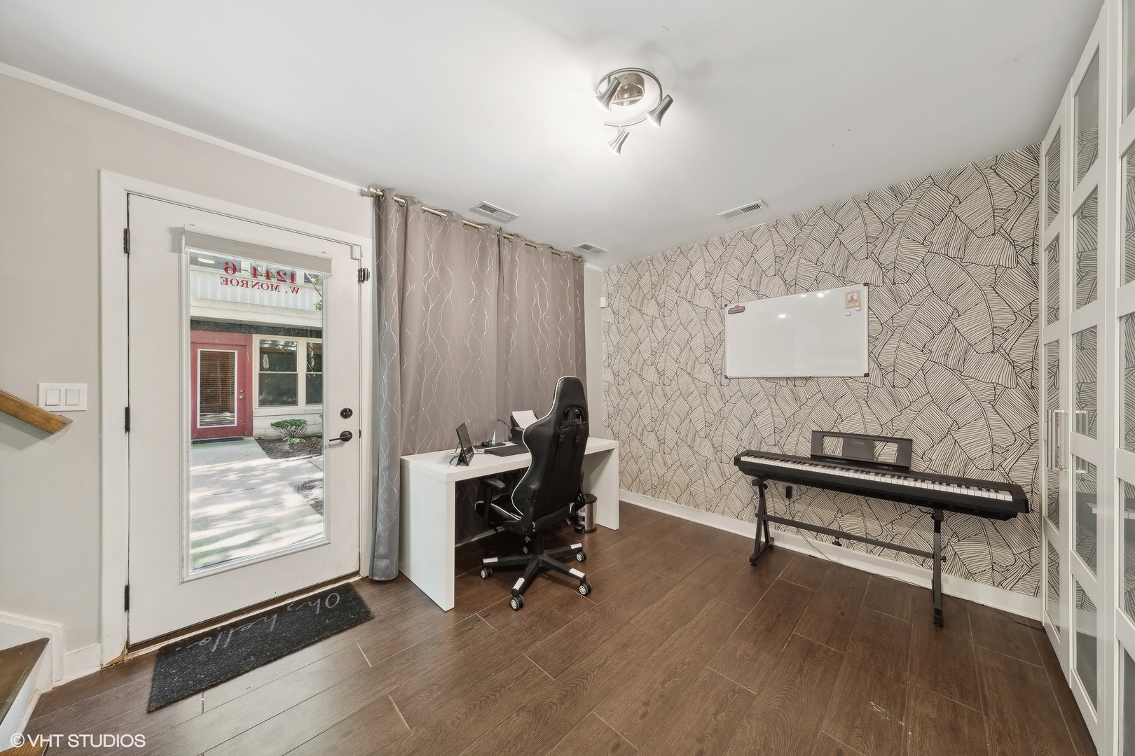 1244 West Monroe Street, Unit 6 Chicago, IL 60607 - Photo 13 of 21 a view of a workspace with furniture and a window