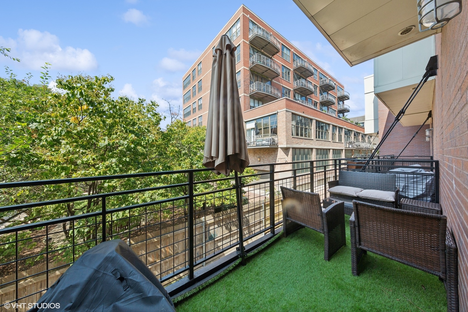 1244 West Monroe Street, Unit 6 Chicago, IL 60607 - Photo 16 of 21 a view of a chairs and table in the deck