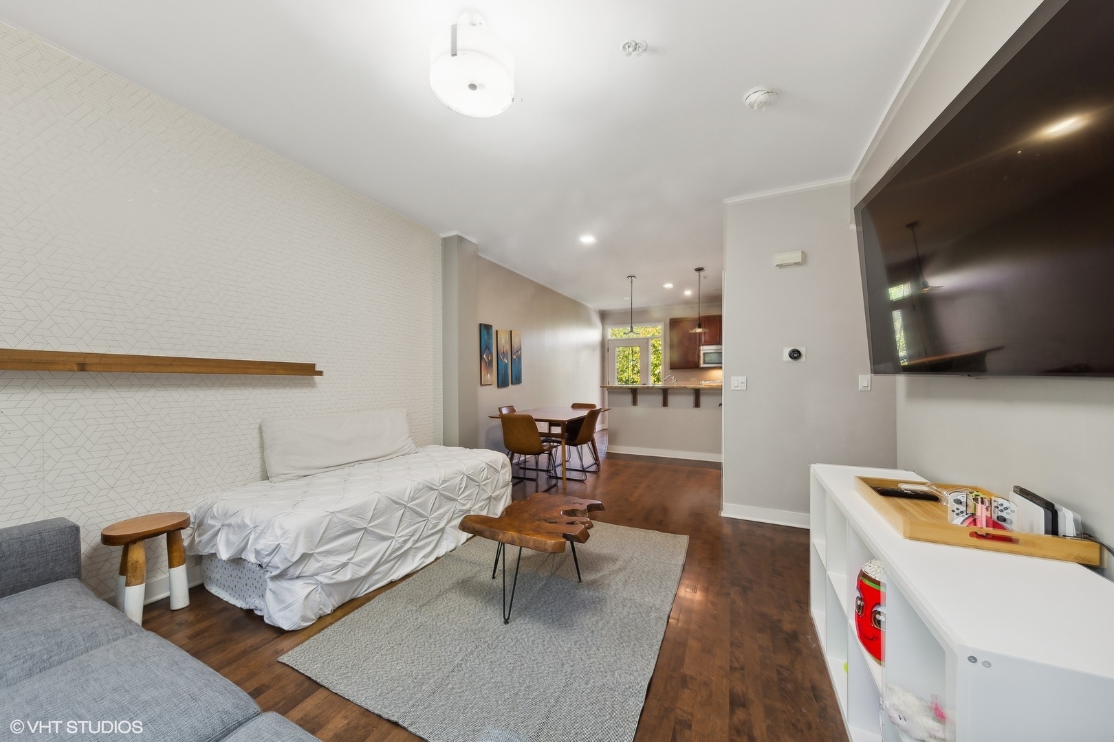 1244 West Monroe Street, Unit 6 Chicago, IL 60607 - Photo 6 of 21 a bedroom with furniture and a couch